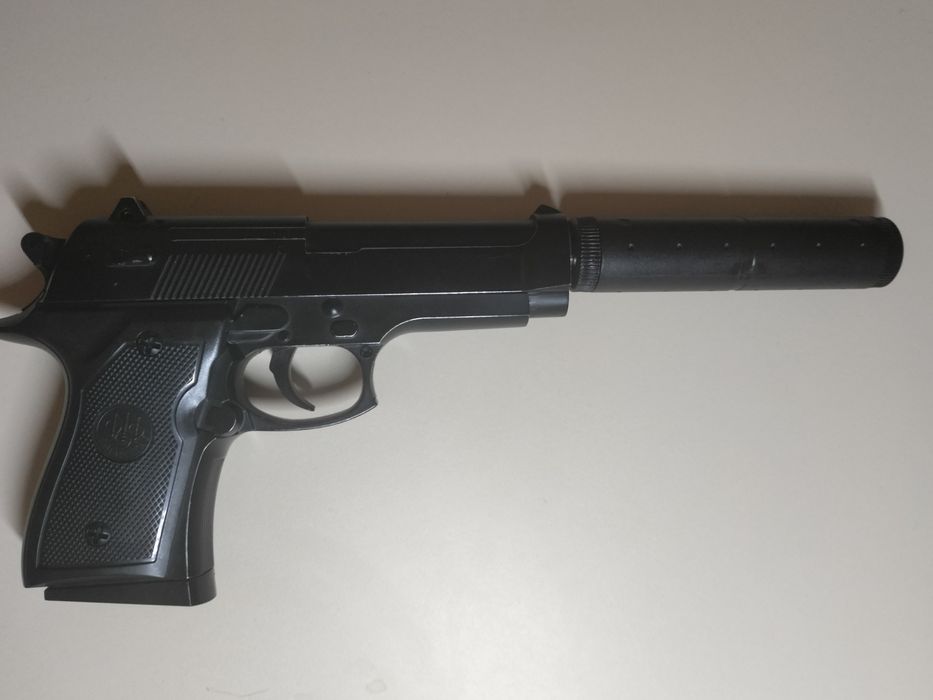 Игрушечный пистолет