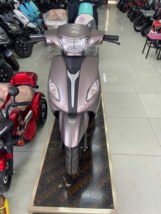 скутер на литиевой батарее EVEGA/lition batareyyali skuter EVEGA