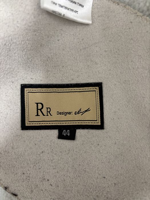 Зимесезонная дубленка