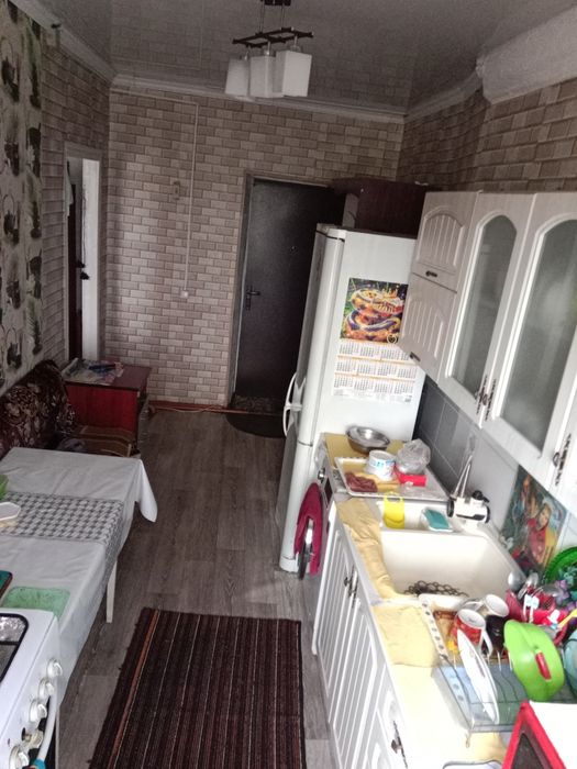 Продам квартиру с участком за домом