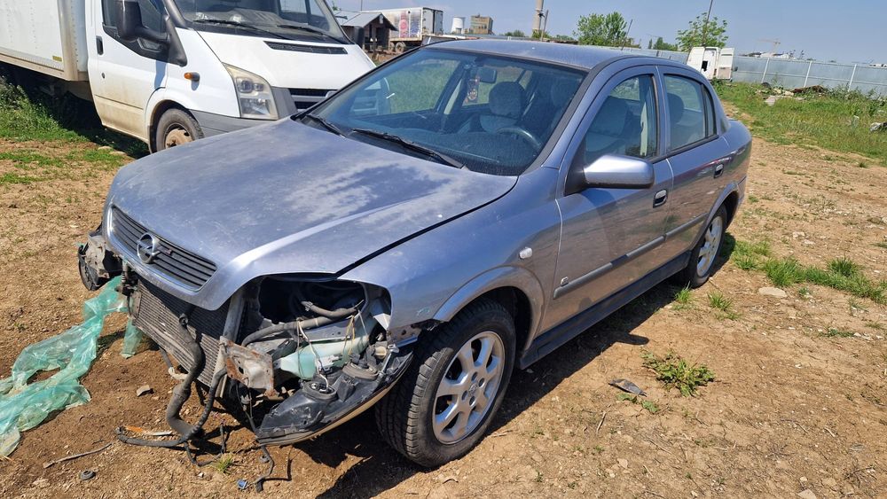 Opel astra G motor cutie viteze 1.6 electromotor usi usa portbagaj hayon roti jante aliaj volan airbag Scaune alternator faruri far pompa servo caseta