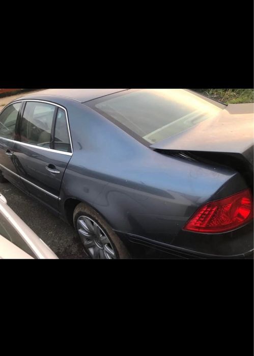 VW Phaeton,usi,navigatie,planse de bord,capota,faruri,