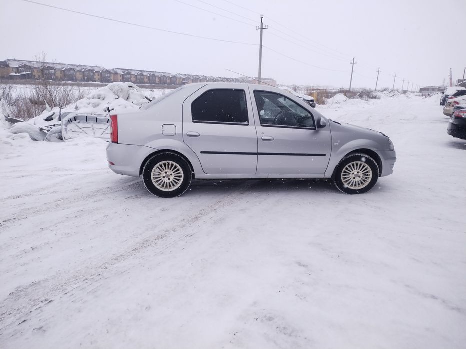 Автомобиль Рено Логан 1