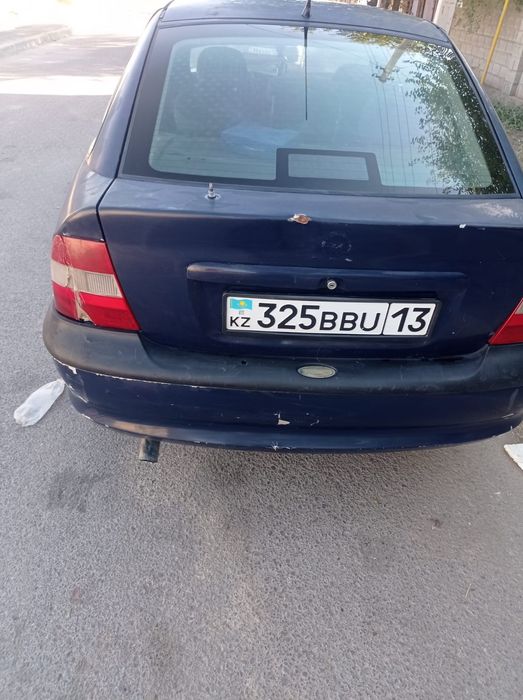 Машина Опел сатам