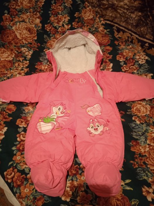 Продам детские зимние комбинезоны