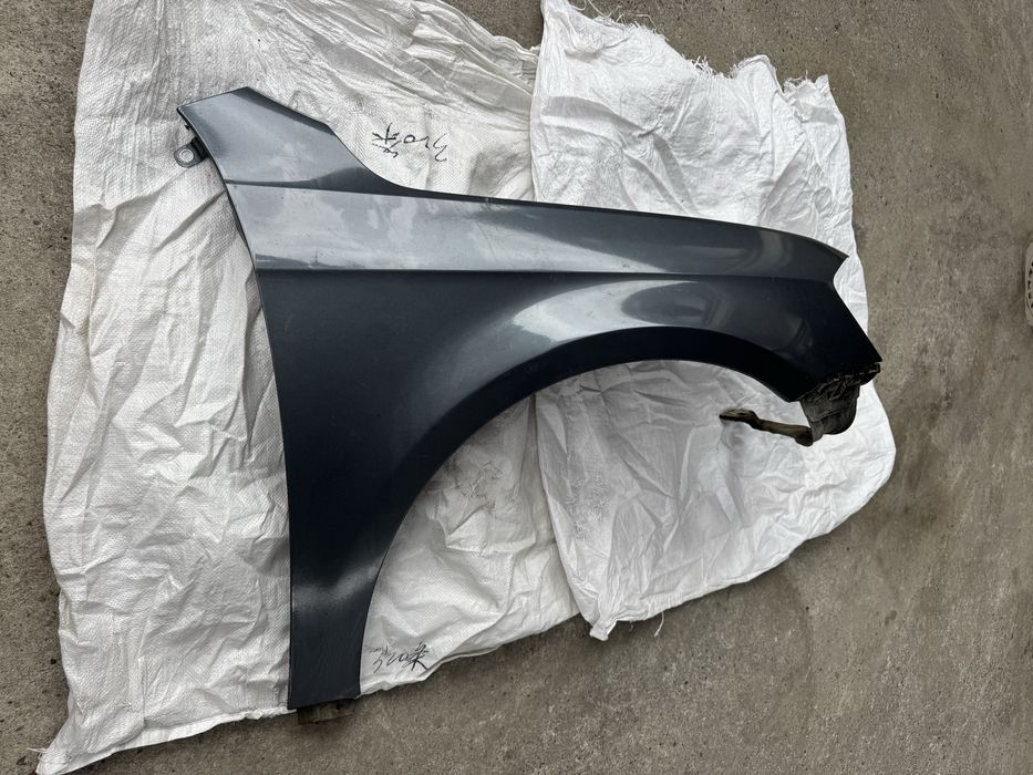 Aripa dreapta fata pt vw passat b7 pe verde