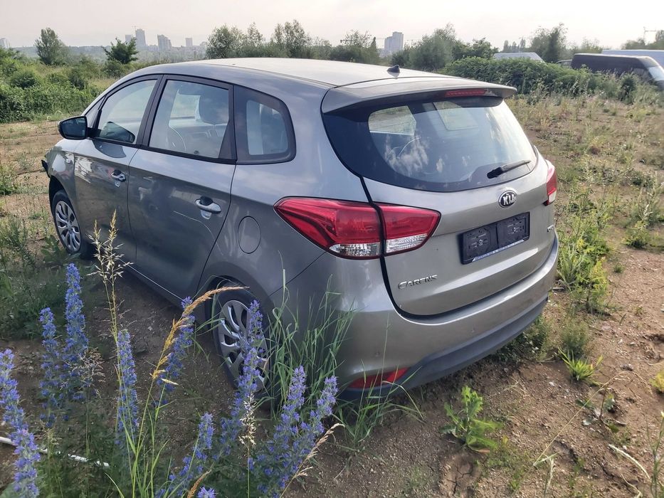 Киа Каренс 2015 г. На части