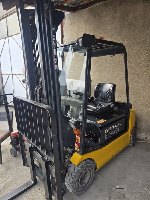Stivuitor electric triplex, marca Still, ridica 1600 kg, la 6m înălțime