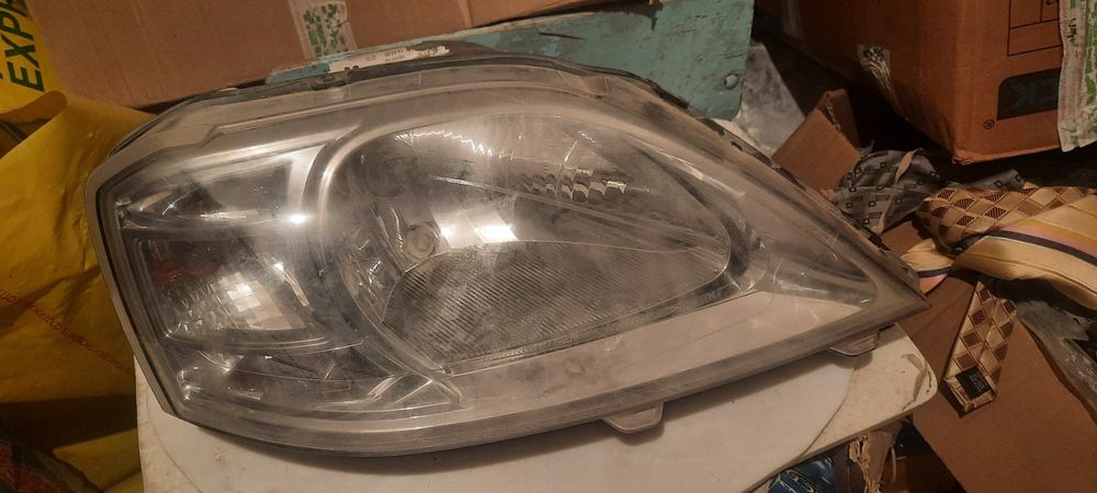 Передний фар ларгус/логон правый буу