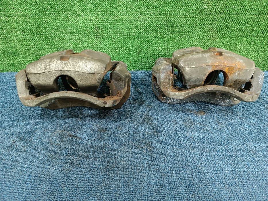 суппорт тормозной передний  Previa Estima 2006г-2015г