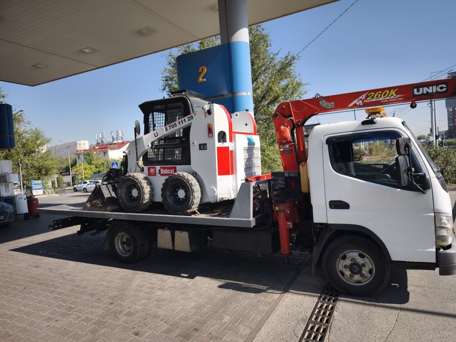 Грузовой эвакуатор манипулятор