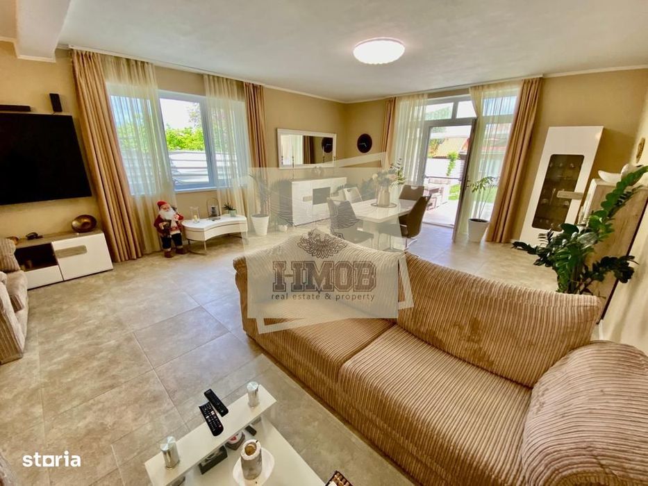Casa cu 4 camere 3 bai 2 terase si teren 450 mp in zona Parcul Sub Ari