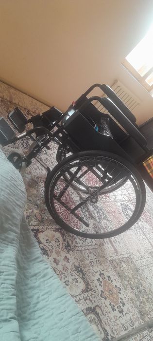 Инвалидная коляска