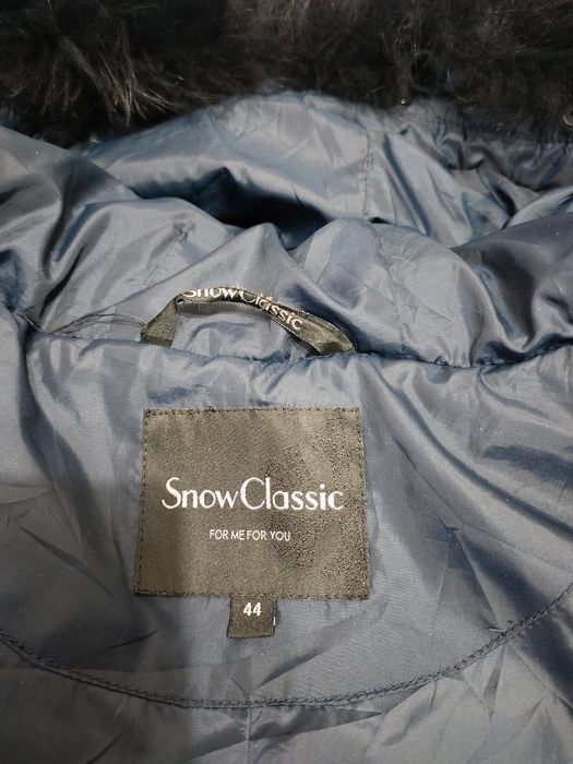 Продам Женский пуховик