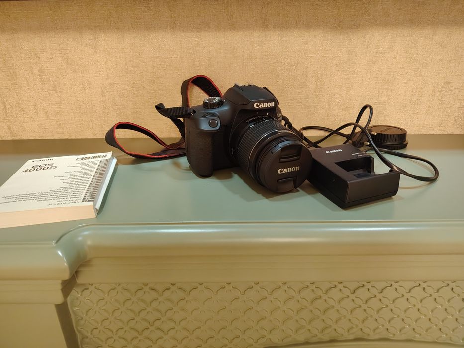 Продам фотоаппарат canon EOS 4000d новый пару раз пользовался!