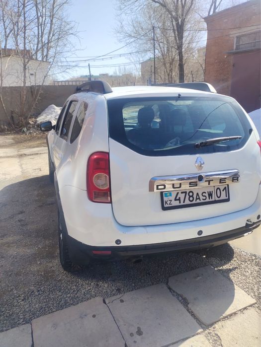 Рено -Дастер 2013год Белый