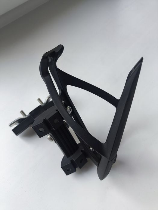 Флягодержатель на седло велосипеда