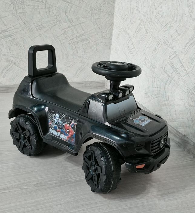 Детская машинка толкунок