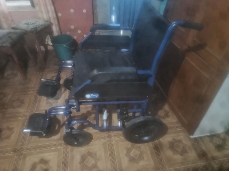 Scaun cu roti handicap