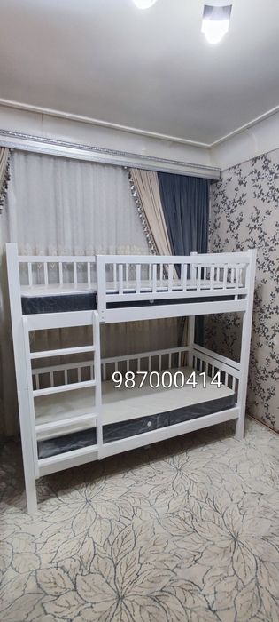 Двухьярусная детская кровать