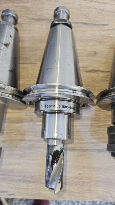 Lot of ISO 50 industrial tooling – arbors, milling heads, and boring head