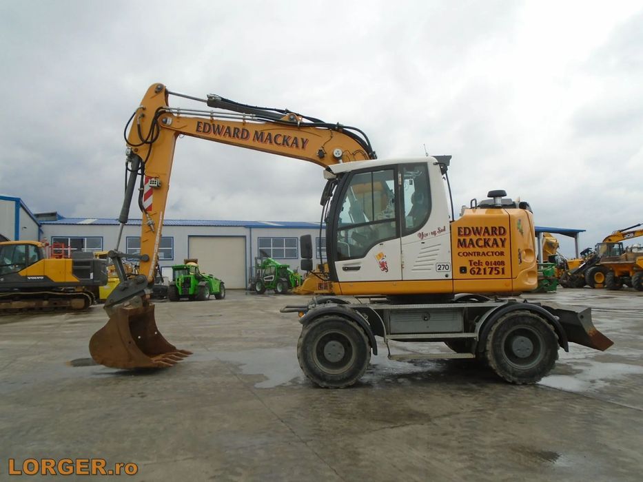 Liebherr A914 Compact Excavator pe pneuri Liebherr A914 Compact