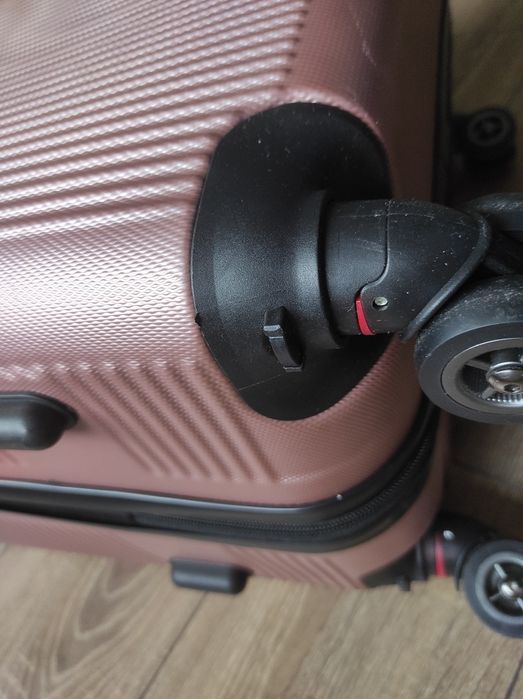 Valiză roz cu roți detașabile