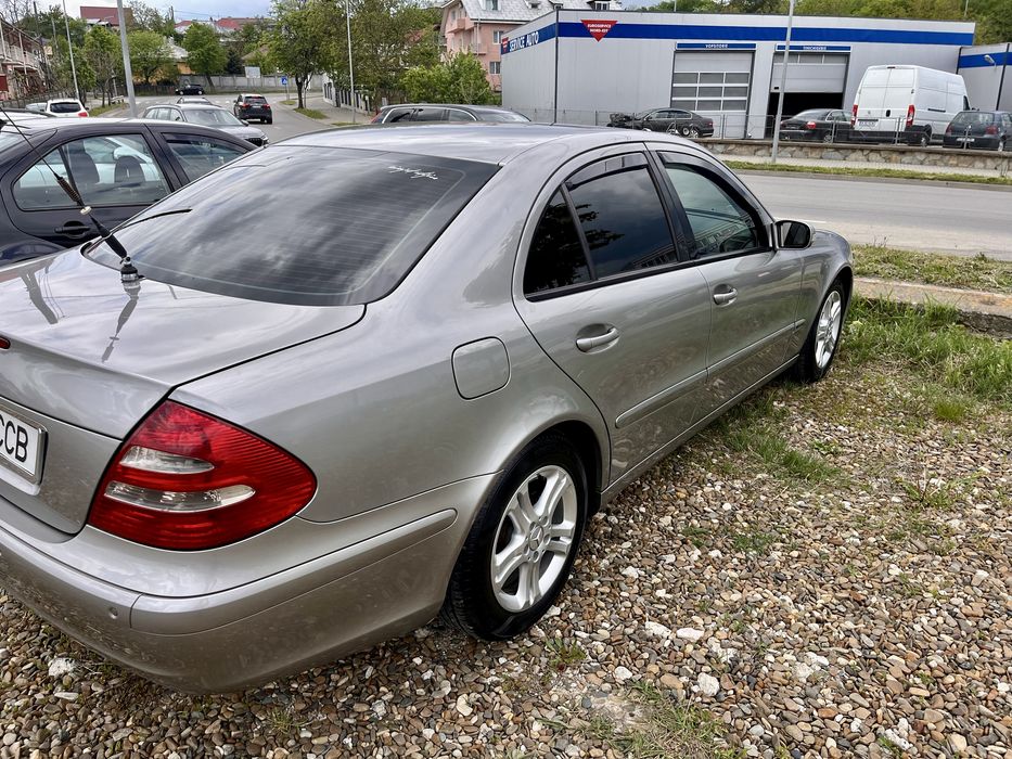 Mercedes  E Class W211