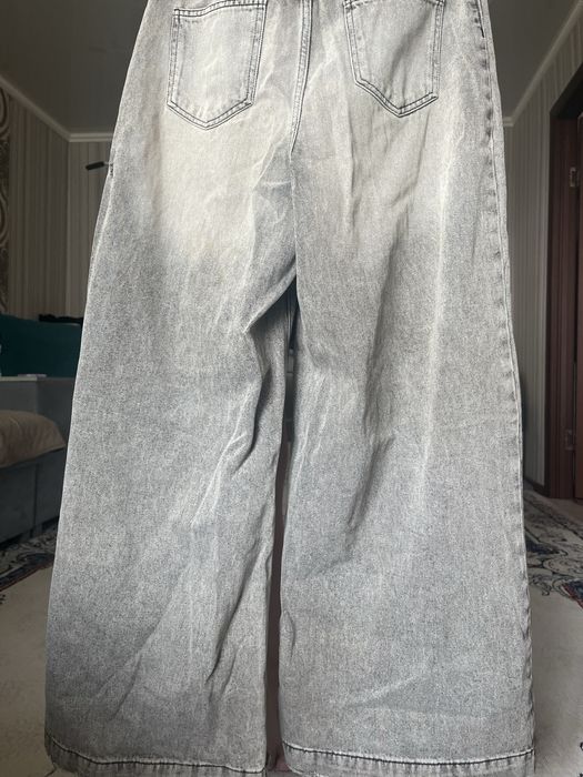 продам джинсы серые