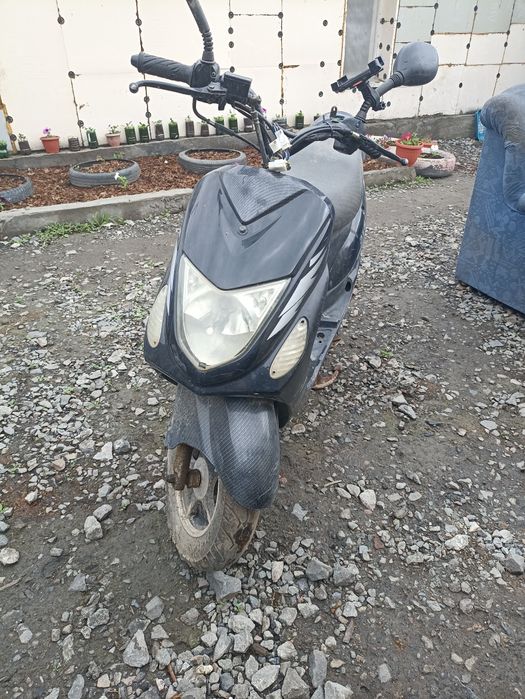 Скутер за 100000
