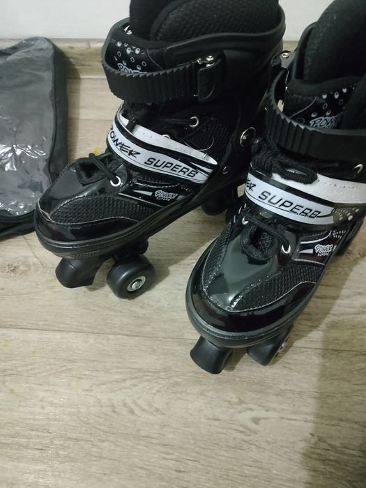 Роликовые коньки