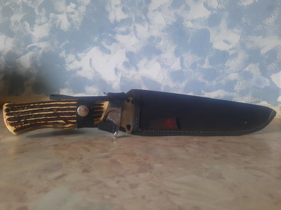 Cutit vanatoare, Depox, lama otel zimtata, 30 cm, teaca inclusa

Estim