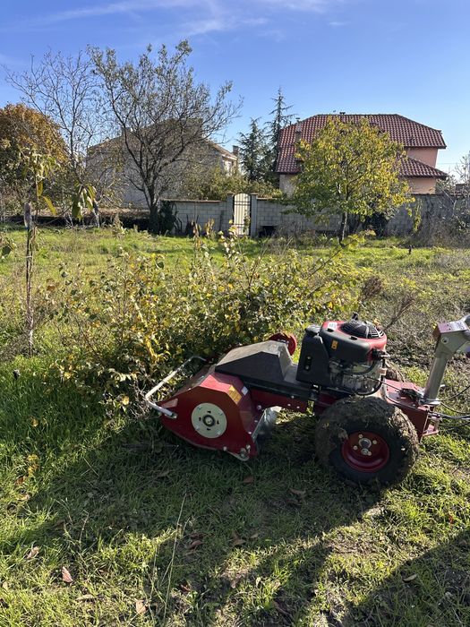 Почистване на дворове, парцели, овощни градини, солари с мулчер