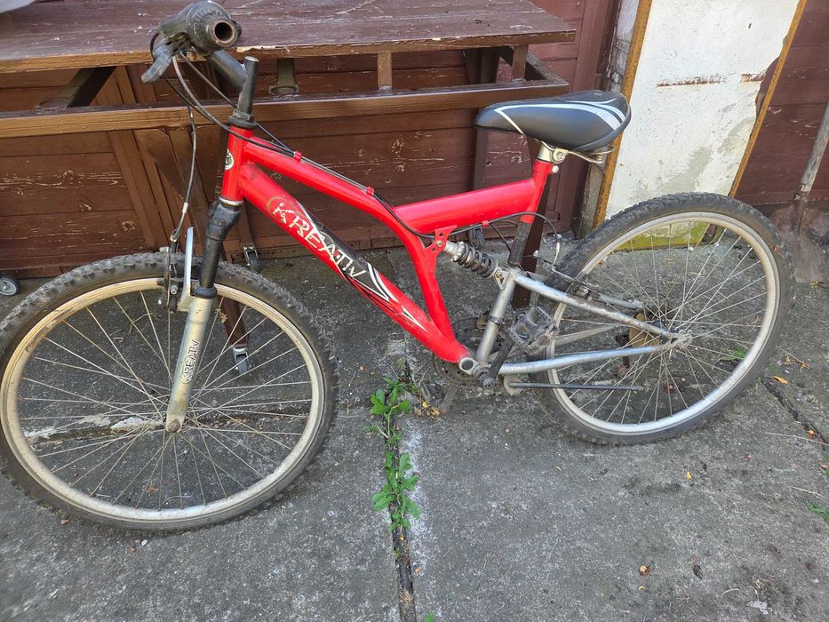 Bicicleta cu suspensii