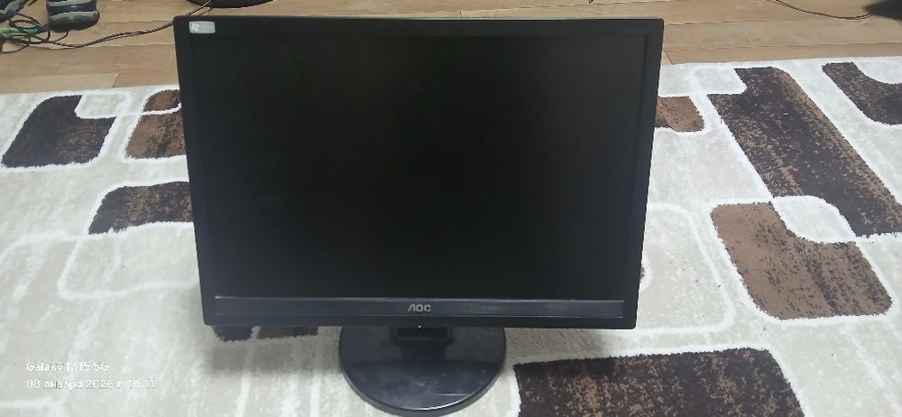 Монитор AOC   в рабочем состоянии