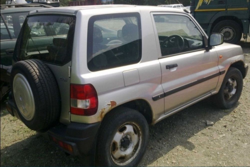 Geam fix caroserie stanga spate 2+1 usi Mitsubishi Pajero Pinin 1.8