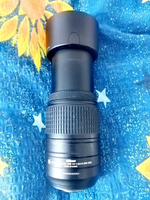 Vând obiectiv Nikkor AF-S 55-300 mm, f/4.5-5.6 G DX cu ED și VR utilizat, în stare bună.