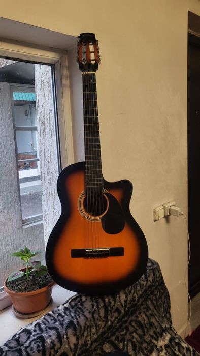 Гитара жаксы жагдайда