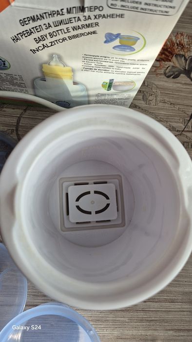 Уред за затопляне на бебешки шишета