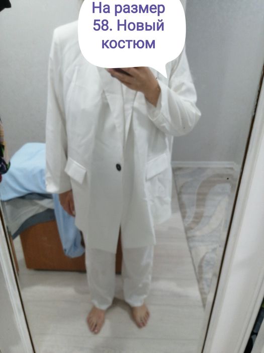 Костюм на р58. Новый, белый