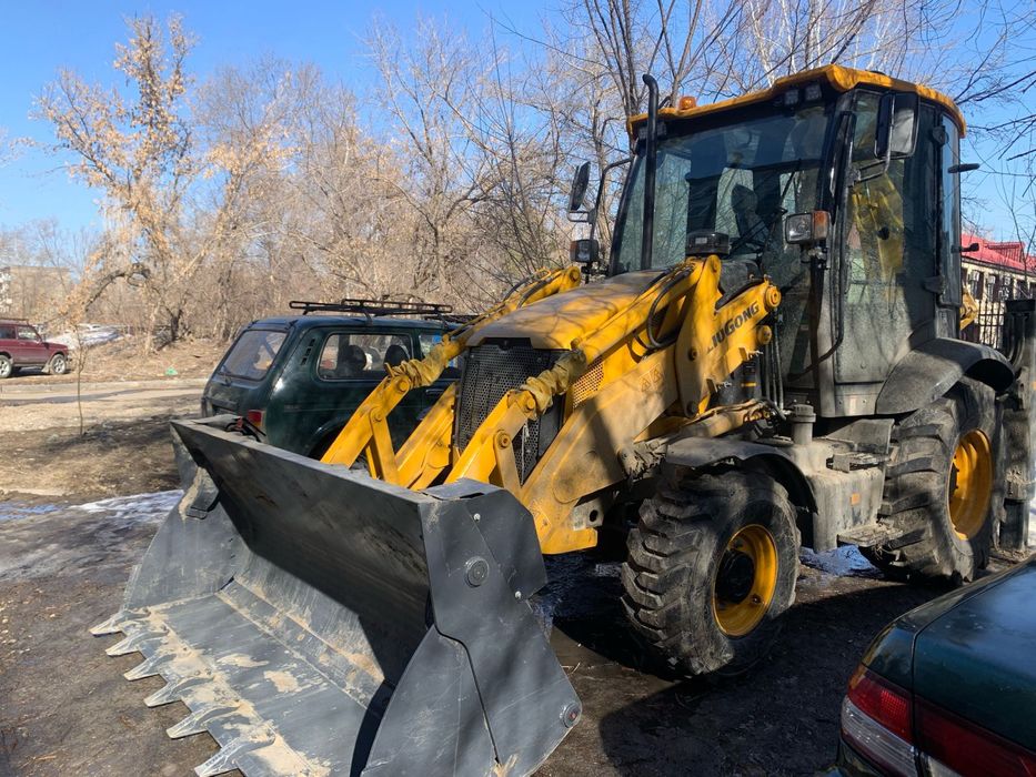 Услуги экскаватора погрузчика,петушок,3в1