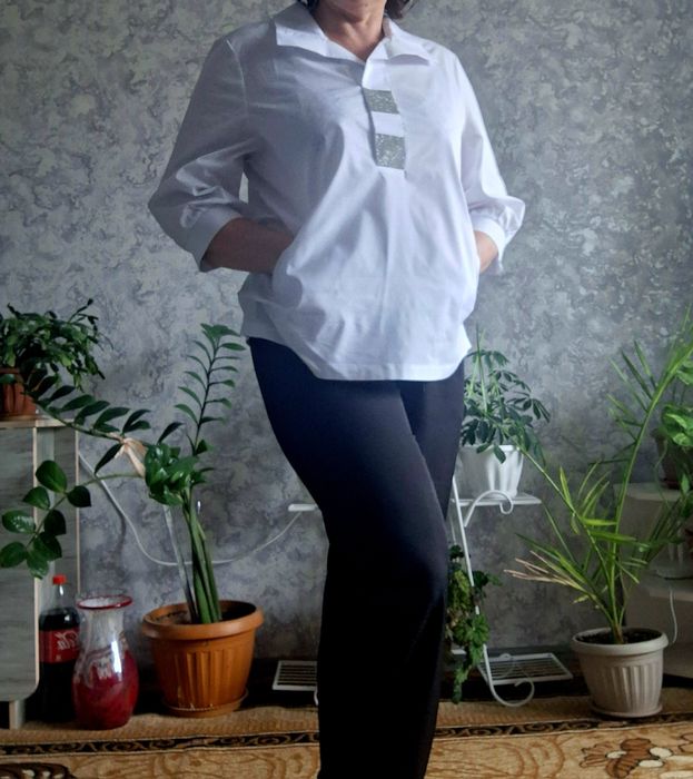 Брючный костюм .