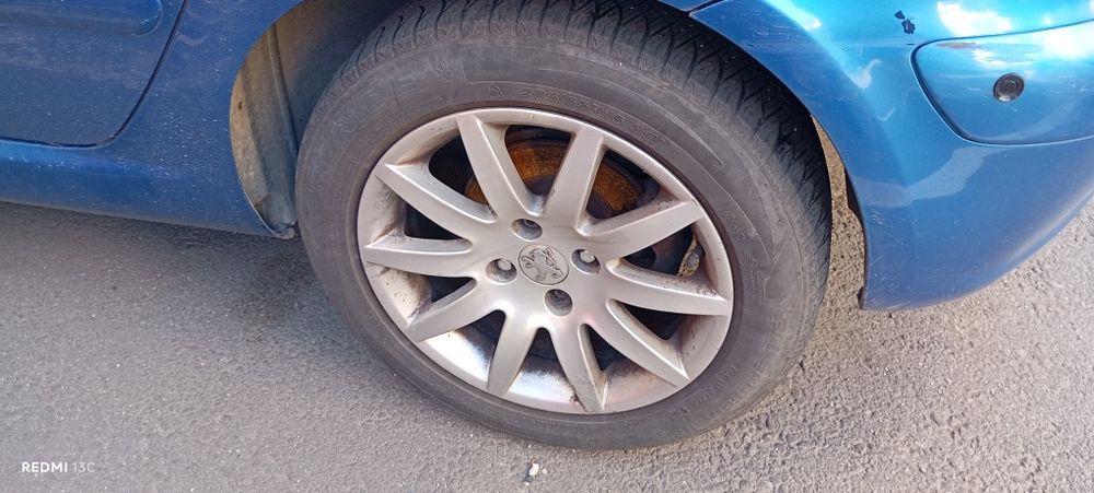 Jante Peugeot 16" + anvelope All Season – 4x108