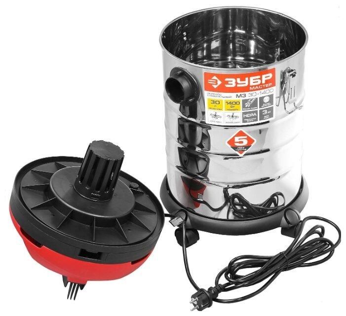 Строительный пылесос ЗУБР со встроенной розеткой и баком 30 литров.