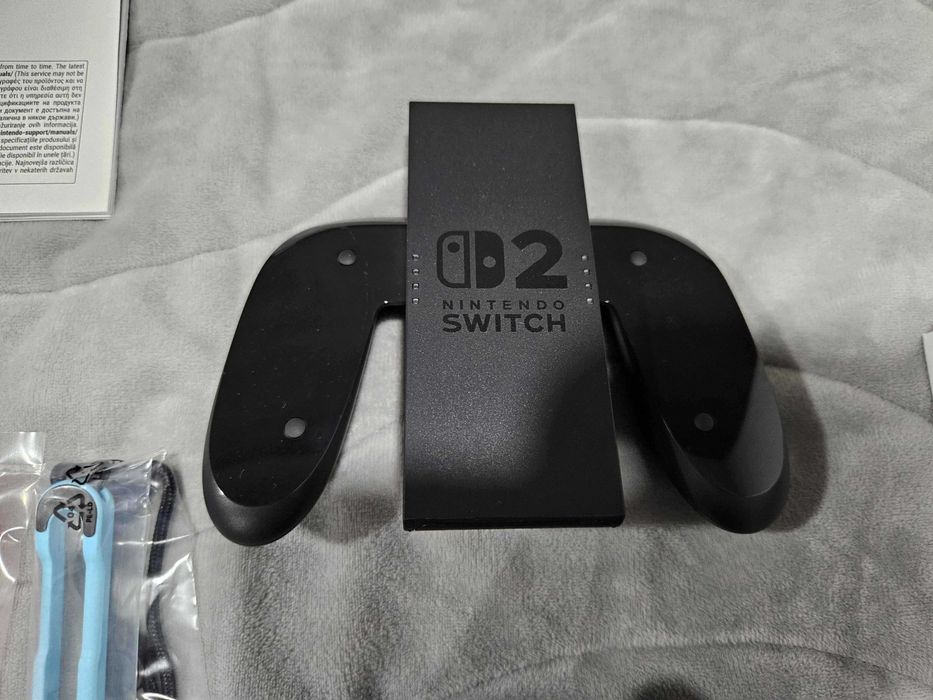 Nintendo Switch 2 комплект (4 игри, контролер, калъф Nacon, силиконов кейс)