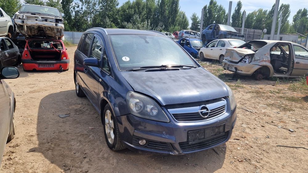 Opel zafira motor cutie faruri capota bara aripa aripi far usi usa portbagaj hayon oglinda scaune interior armatura volan stop stopuri roti jante