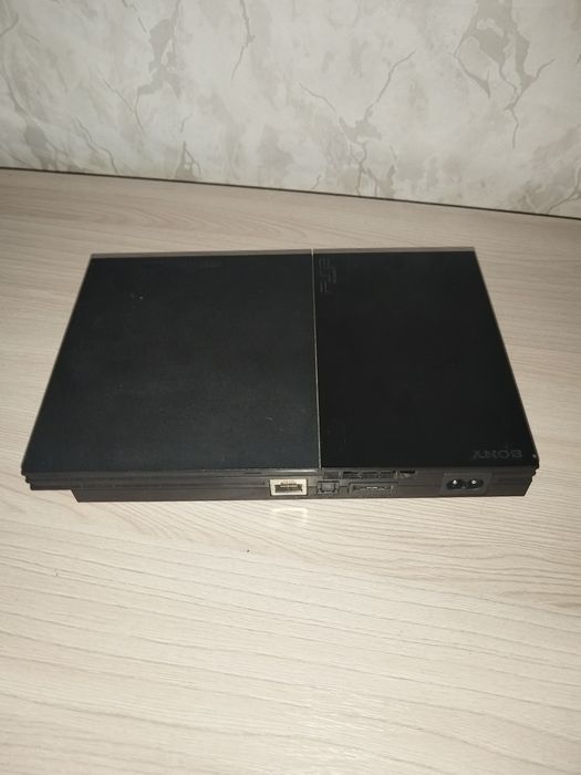 Продам playstation 2 + 64 mb memory card