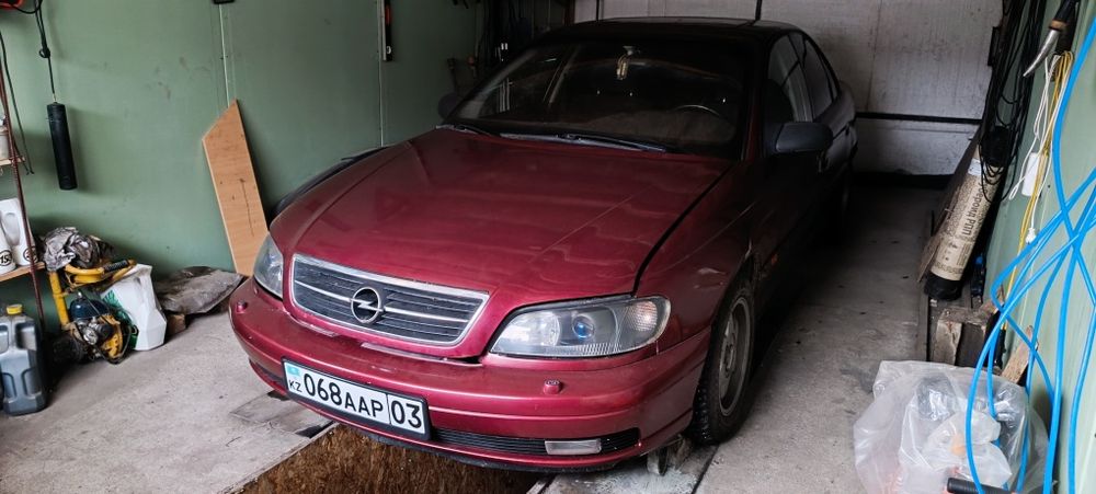 Опель омега б 2.0