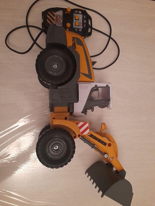 Булдозер игрушка.