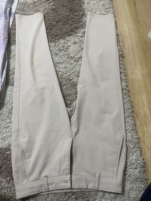 Бежевые брюки Zara